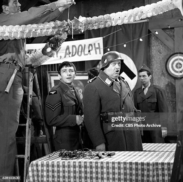 Hogan's Heroes episode Happy Birthday, Adolf. Pictured, from left, is Richard Dawson and Werner Klemperer . Image dated July 14, 1965. Original...