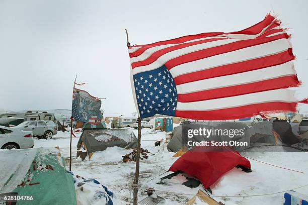 Winds whip across Oceti Sakowin Camp as blizzard conditions grip the area around the Standing Rock Sioux Reservation on December 6, 2016 outside...