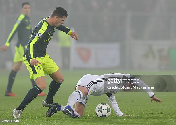 Granit Xhaka of Arsenal tackles Taulant Xhaka of Basel during the UEFA Champions League match between FC Basel and Arsenal at St. Jakob-Park on...