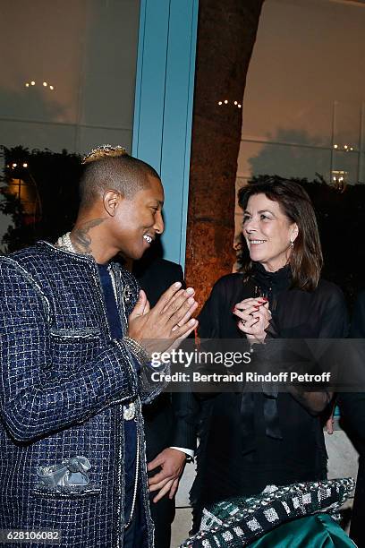Pharrell Williams and Princess Caroline de Hanovre attend the "Chanel Collection des Metiers d'Art 2016/17 : Paris Cosmopolite" : Show at Hotel Ritz...