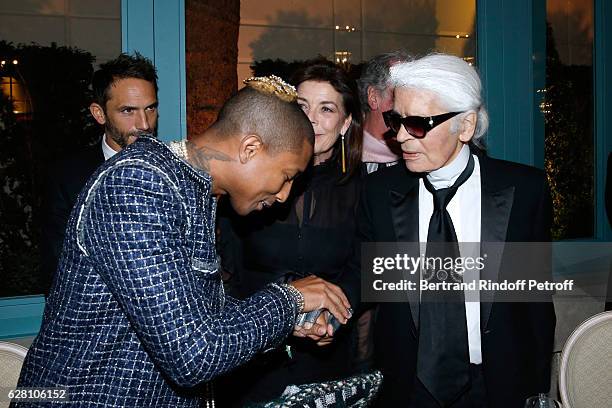 Pharrell Williams, Princess Caroline de Hanovre and stylist Karl Lagerfeld attend the "Chanel Collection des Metiers d'Art 2016/17 : Paris...