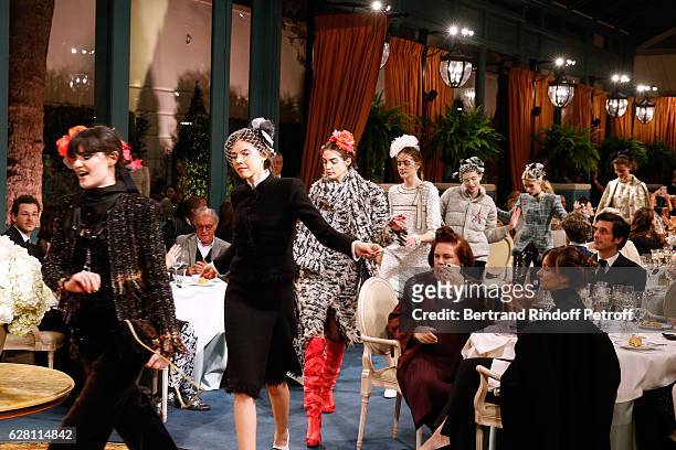 Models walk the runway during the "Chanel Collection des Metiers d'Art 2016/17 : Paris Cosmopolite" : Show at Hotel Ritz on December 6, 2016 in...
