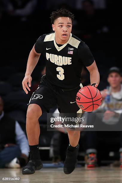 Carsen Edwards of the Purdue Boilermakers dribbles up court against the Arizona State Sun Devils in the first half during the Jimmy V Classic at...