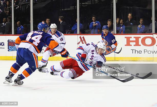 Jimmy Vesey of the New York Rangers gets the first period shot off against the New York Islanders at the Barclays Center on December 6, 2016 in the...