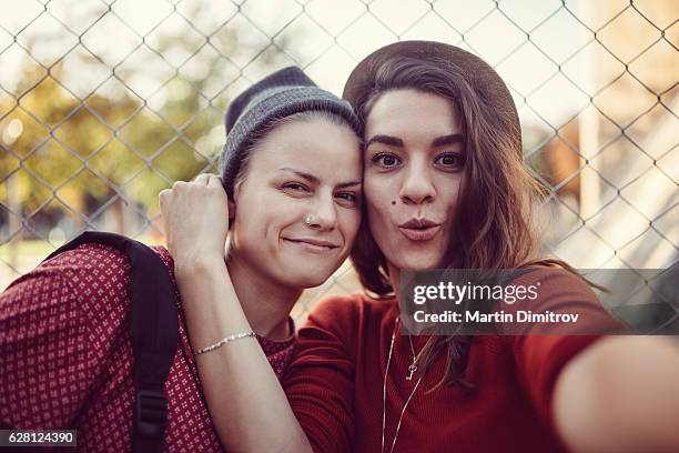 happy lesbian couple - photos of lesbians kissing stock pictures, royalty-free photos & images