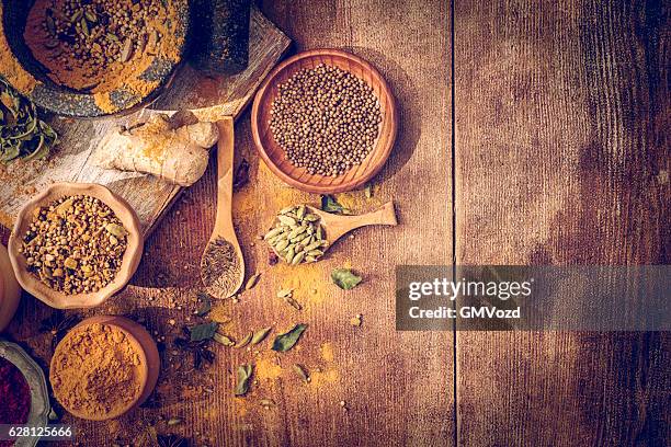 spices and herbs on wooden background - mustard plant stock pictures, royalty-free photos & images