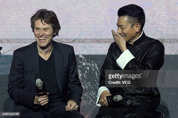 American actor Willem Dafoe and Hong Kong actor Andy Lau attend the premiere of director Zhang Yimou's film "The Great Wall" on December 6, 2016 in...