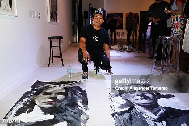 Artist Robert Vargas live paints at Lexus Presents Obras de Arte at MANA Garage on December 6, 2016 in Miami, Florida.