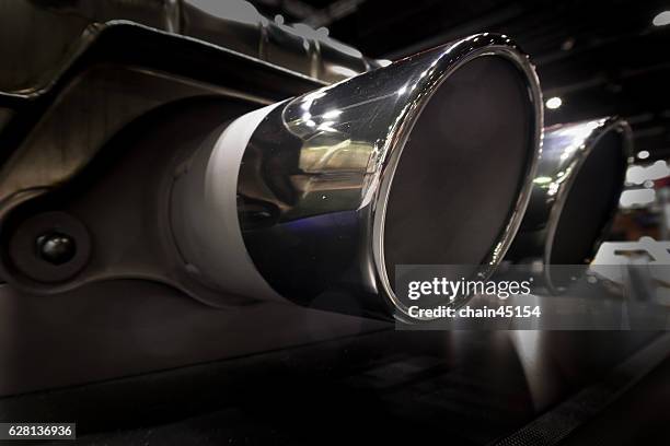 close up of a car dual exhaust pipe - slipstream sports stock pictures, royalty-free photos & images