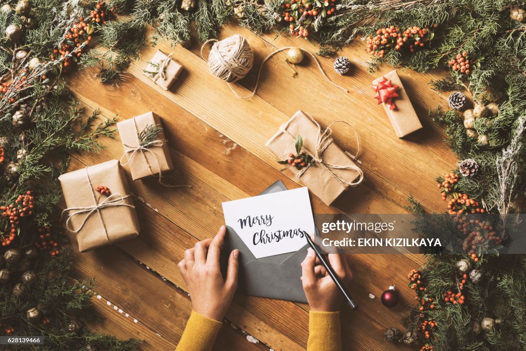 Writing greeting cards, Christmas table top flat lay