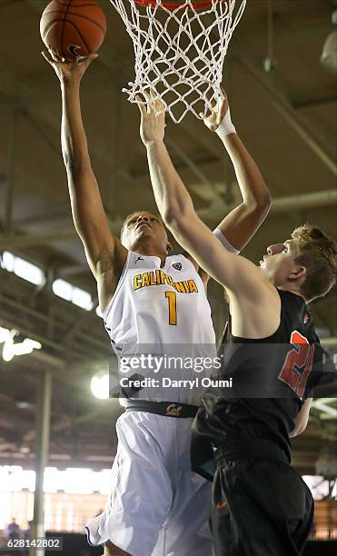 Ivan Rabb of the California Golden Bears shoots over Henry Caruso of the Princeton Tigers during the second half of the Pearl Harbor Invitational...