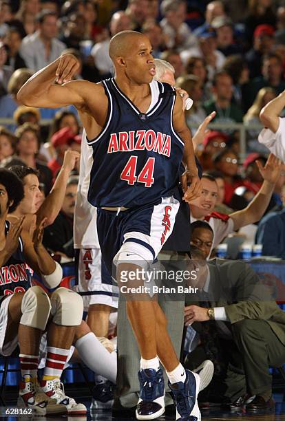 Richard Jefferson of Arizona celebrates after making a shot against Michigan State during the semifinal of the Men's NCAA Basketball Final Four...