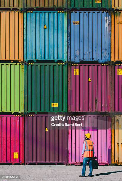 the engineer working with cargo containers - activity at port of tanjung priok in jakarta stockfoto's en -beelden