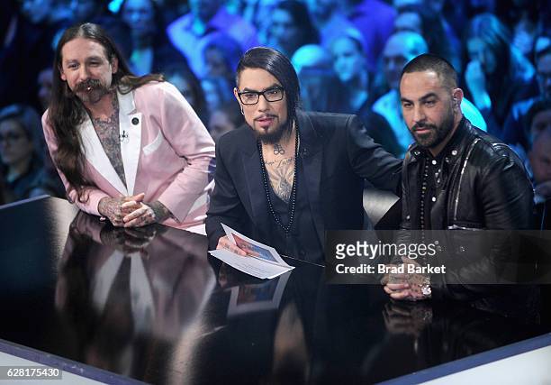 Host Dave Navarro flanked by judges Oliver Peck and Chris Nunez onstage during "Ink Master" Season 8 Live Finale at at Manhattan Center Grand...