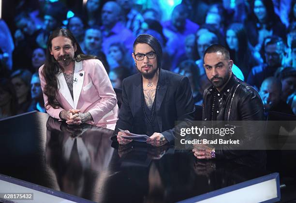 Host Dave Navarro flanked by judges Oliver Peck and Chris Nunez onstage during "Ink Master" Season 8 Live Finale at at Manhattan Center Grand...