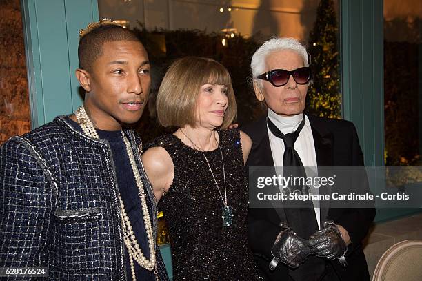 Pharrell Williams, Anna Wintour and Karl Lagerfeld attend the "Chanel Collection des Metiers d'Art 2016/17 : Paris Cosmopolite" show at the Ritz...