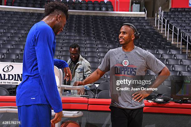 Chris Paul of the LA Clippers talks with Reggie Bullock of the Detroit Pistons before the game on November 7, 2016 at the STAPLES Center in Los...