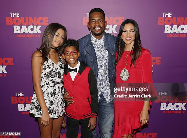 Bill Bellamy poses with his wife Kristen Baker Bellamy and their children Baron Bellamy and Bailey Ivory-Rose Bellamy at the Premiere Of Viva...