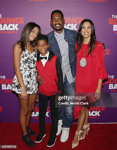 Bill Bellamy poses with his wife Kristen Baker Bellamy and their children Baron Bellamy and Bailey Ivory-Rose Bellamy at the Premiere Of Viva...