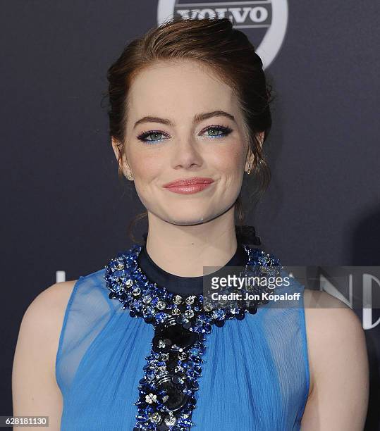 Actress Emma Stone arrives at the Los Angeles Premiere "La La Land" at Mann Village Theatre on December 6, 2016 in Westwood, California.
