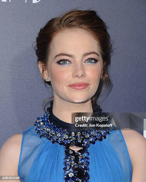 Actress Emma Stone arrives at the Los Angeles Premiere "La La Land" at Mann Village Theatre on December 6, 2016 in Westwood, California.