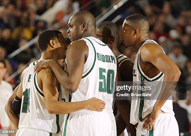 The Michigan State players huddle together during the semifinal of the Men's NCAA Basketball Final Four tournament against Arizona at the Metrodome...