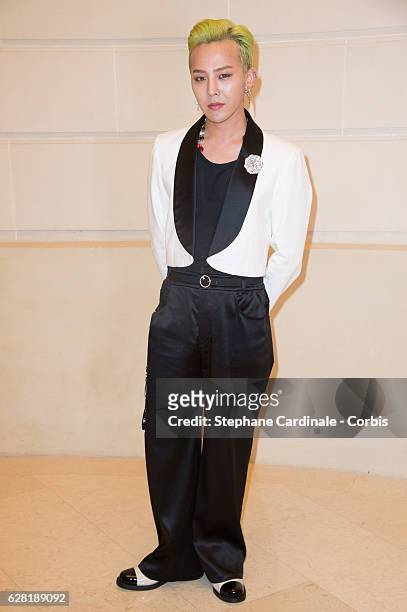 Singer Kwon Ji-Yong alias. G-Dragon attends the "Chanel Collection des Metiers d'Art 2016/17 : Paris Cosmopolite" show on December 6, 2016 in Paris,...