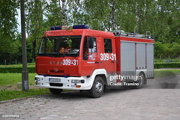 firetruck based on star 12-157 stopped on the street - poolse cultuur stockfoto's en -beelden