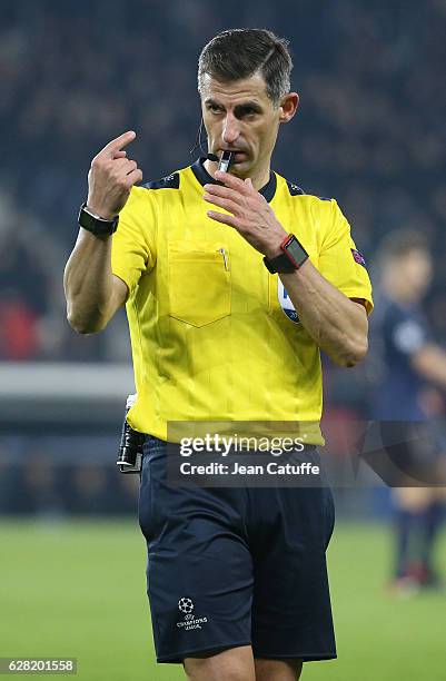 Referee Tasos Sidiropoulos of Greece gestures during the UEFA Champions League match between Paris Saint-Germain and PFC Ludogorets Razgrad at Parc...