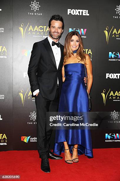 Ada Nicodemou and Charlie Clausen arrive ahead of the 6th AACTA Awards Presented by Foxtel at The Star on December 7, 2016 in Sydney, Australia.