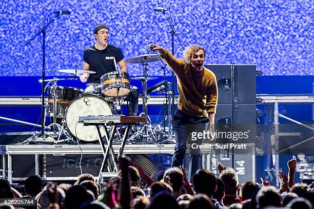 Ryan Winnen and Chase Lawrence of Coin perform at Deck the Hall Ball at KeyArena on December 6, 2016 in Seattle, Washington.