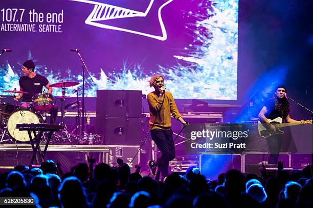 Ryan Winnen, Chase Lawrence and Joe Memmel of Coin perform at Deck the Hall Ball at KeyArena on December 6, 2016 in Seattle, Washington.