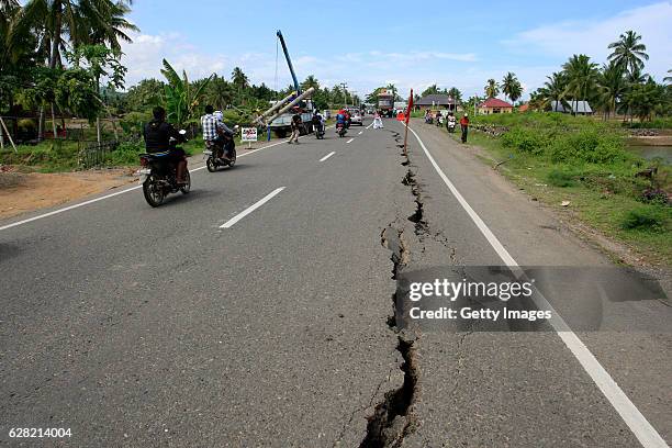 Roads cracked in the quake of 6.4 magnitude on December 7, 2016 in Sigli, Aceh Province, Indonesia. An undersea earthquake struck Indonesia's...