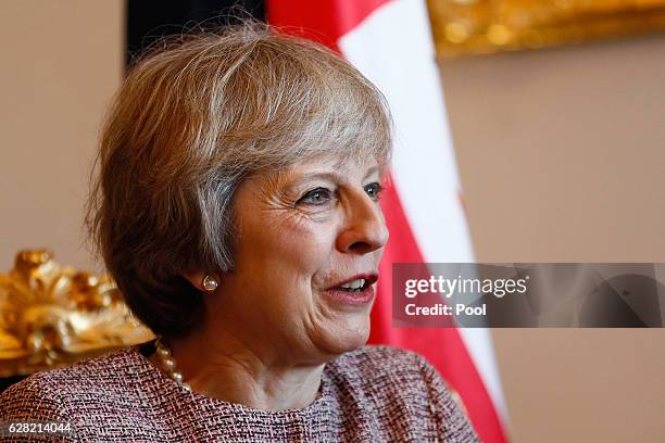 Britain's Prime Minister Theresa May meets Oman's Deputy Prime Minister Fahad bin Mahmood at the Oman villa on December 7, 2016 in Manama, Bahrain.