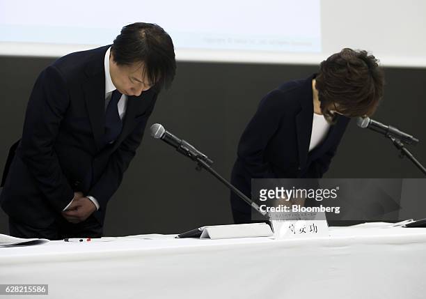 Isao Moriyasu, president and chief executive officer of DeNA Co., left, and Tomoko Namba, founder and chairman, bow during a news conference in...