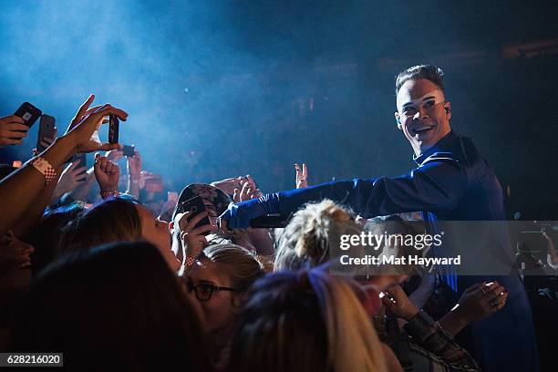 Luke Steele of Empire of the Sun performs on stage during Deck The Hall Ball hosted by 107.7 The End at KeyArena on December 6, 2016 in Seattle,...