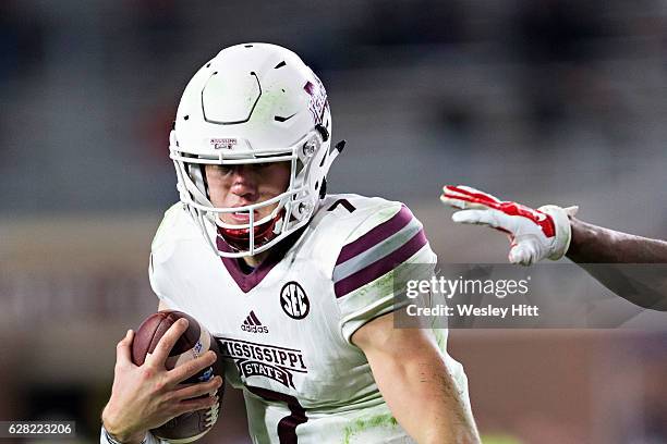 Nick Fitzgerald of the Mississippi State Bulldogs runs the ball during a game against the Mississippi Rebels at Vaught-Hemingway Stadium on November...