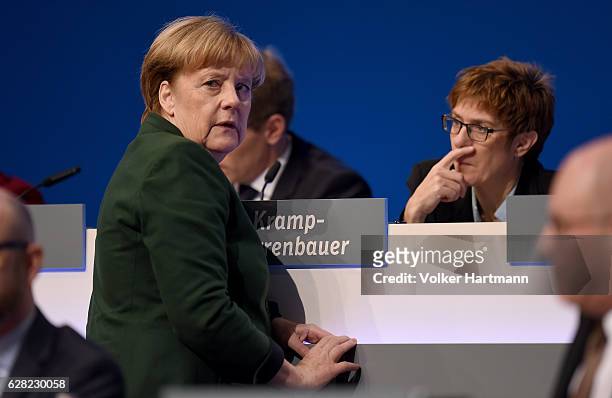Chancellor and Chairwoman of the German Christian Democrats Angela Merkel speaks on the Podium with the Prime Minister of the Saarland, Annegret...