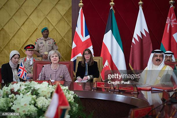 Prime Minister Theresa May attends a working session of the Gulf Cooperation Council meeting with the King of Bahrain King Hamad Bin Isa Khalifa on...
