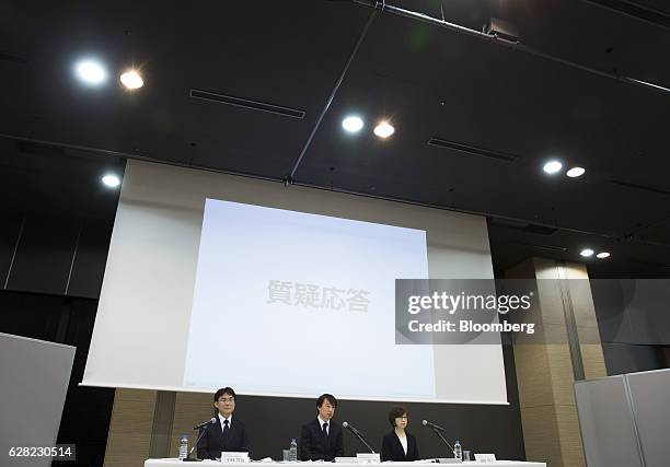 Isao Moriyasu, president and chief executive officer of DeNA Co., center, Tomoko Namba, founder and chairman, right, and Kenji Kobayashi, executive...