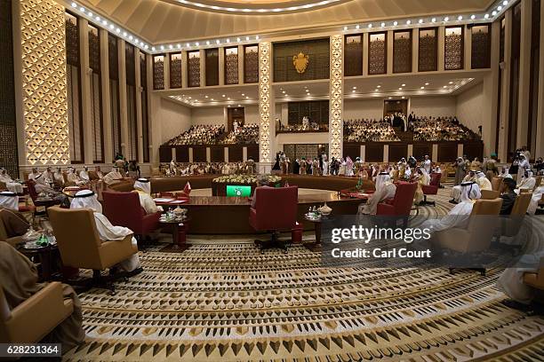 British Prime Minister, Theresa May attends a plenary session on the second day of the Gulf Cooperation Council summit, on December 7, 2016 in...