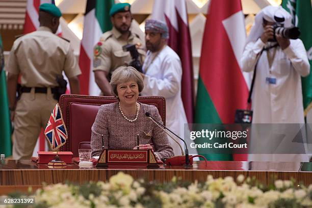 British Prime Minister, Theresa May, attends a plenary session on the second day of the Gulf Cooperation Council summit, on December 7, 2016 in...