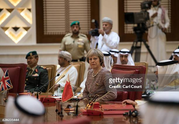 British Prime Minister, Theresa May, attends a plenary session on the second day of the Gulf Cooperation Council summit, on December 7, 2016 in...