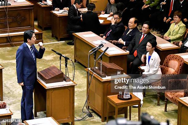 Japanese Prime Minister and ruling Liberal Democratic Party President Shinzo Abe responds questions from opposition Democratic Party President Renho...