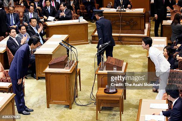 Japanese Prime Minister and ruling Liberal Democratic Party President Shinzo Abe and opposition Democratic Party President Renho bow prior to their...