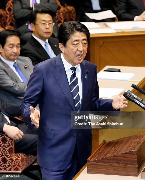 Japanese Prime Minister and ruling Liberal Democratic Party President Shinzo Abe responds questions from opposition Democratic Party President Renho...