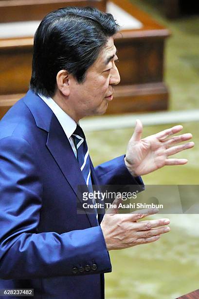 Japanese Prime Minister and ruling Liberal Democratic Party President Shinzo Abe responds questions from opposition Democratic Party President Renho...