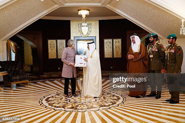 Britain's Prime Minister Theresa May meets King of Bahrain King Hamad Bin Isa Khalifa on December 7, 2016 in Manama, Bahrain.