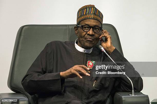 Muhammadu Buhari, Nigeria's president, looks on during the International Forum on Peace and Security In Africa, in Dakar, Senegal, on Tuesday, Dec....