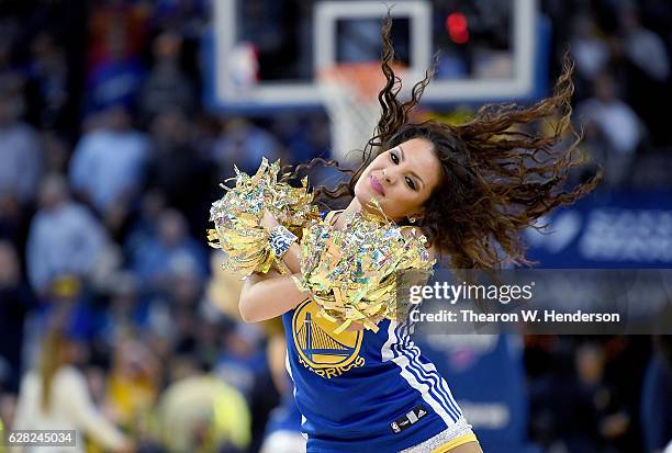 The Golden State Warriors dance team performs during an NBA basketball game between the Houston Rockets and Golden State Warriors at ORACLE Arena on...